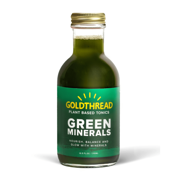 Bottle of Goldthread Green Minerals on a white background
