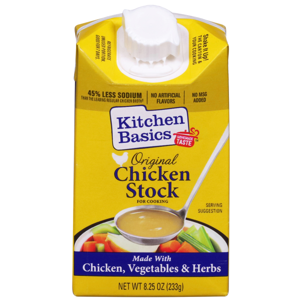 Kitchen Basics chicken stock carton with a spoon on top
