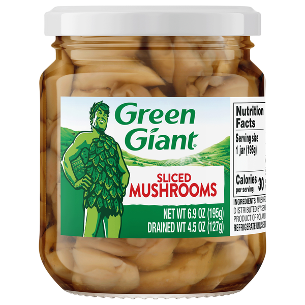Jar of Green Giant sliced mushrooms on a white background
