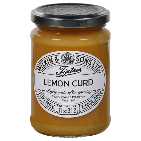 Jar of Tiptree Lemon Curd with a silver lid on a white background
