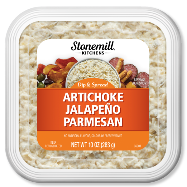 Packaged artichoke jalapeño parmesan dip from Stonemill Kitchens on a white background