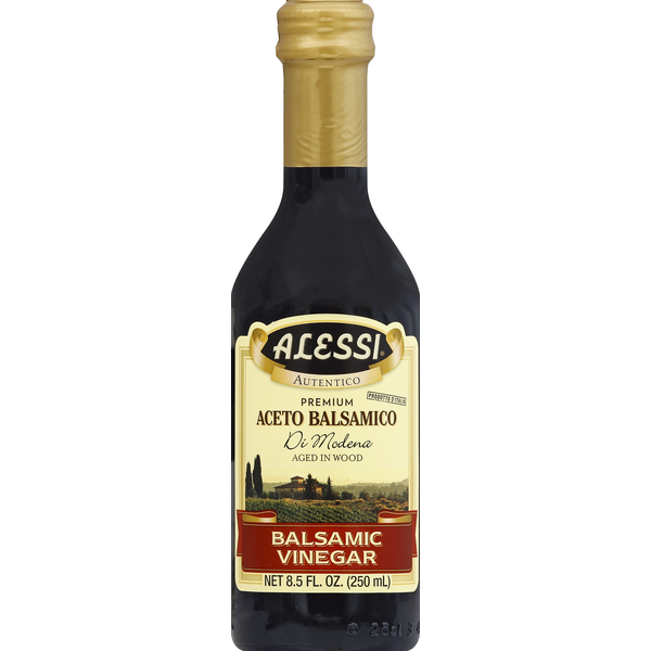 A bottle of Alessi balsamic vinegar on a white background