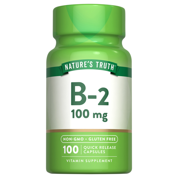 Green bottle of Nature's Truth B-2 100 mg vitamin supplement on a white background