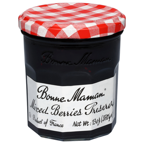 Jar of Bonne Maman Mixed Berries Preserve with a red and white checkered lid on a white background