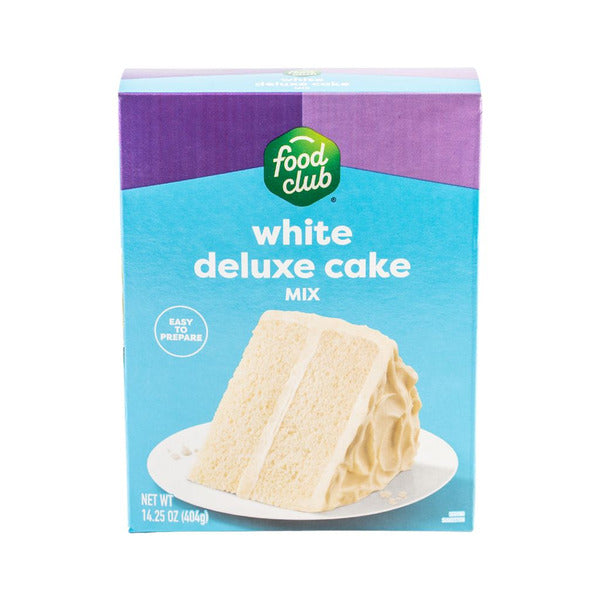 Box of Food Club white deluxe cake mix on a white background